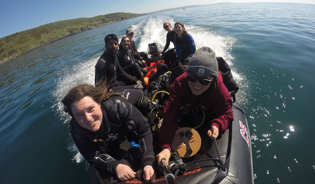 A group of BSAC divers out on a boat ready to dive