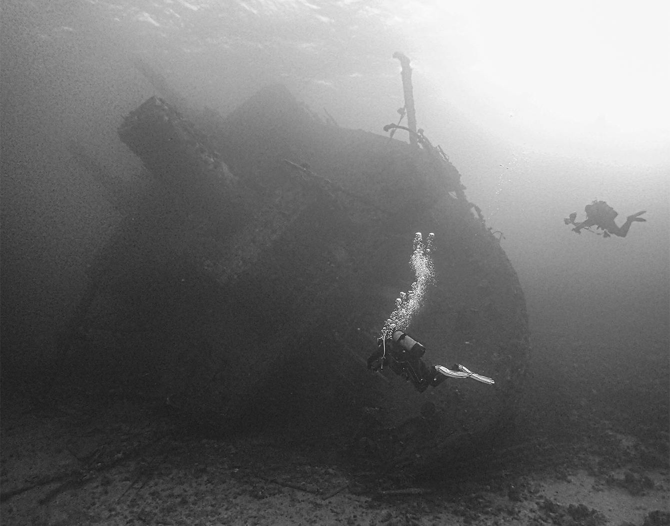 Two divers on a wreck