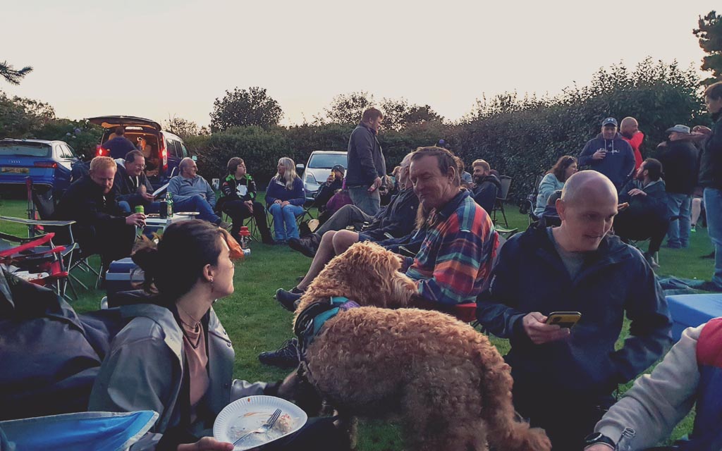 Barbecue and raffle at Cardinney camping park at sunset