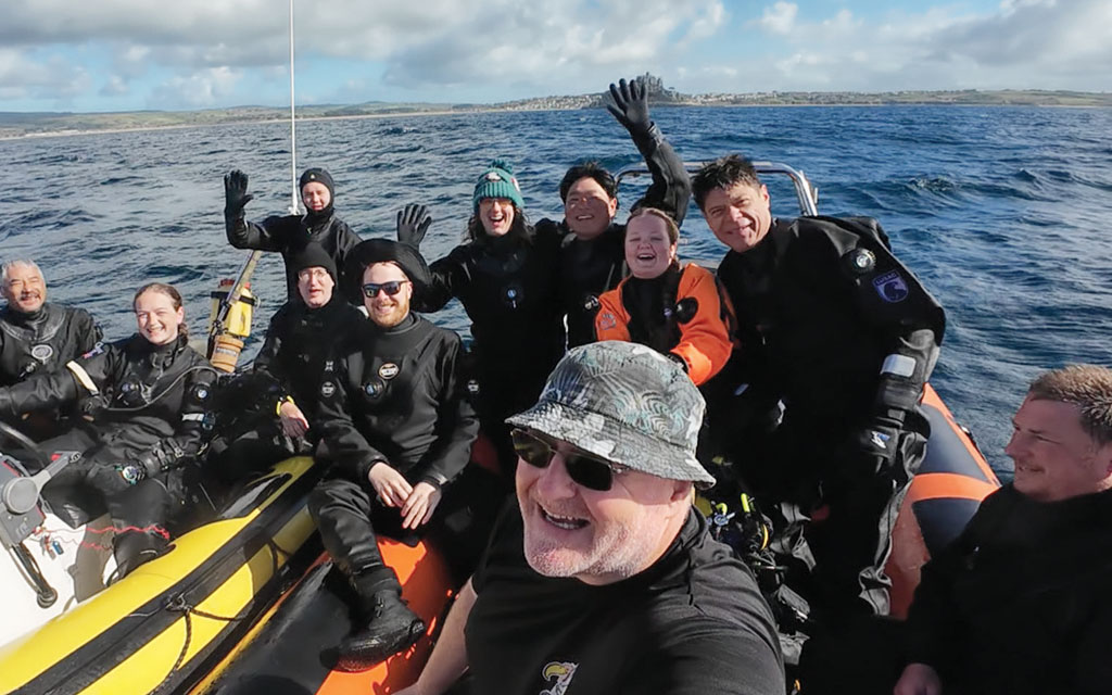 The team on the boats after a successful dive