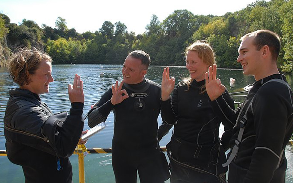 Instructors topside planning a dive