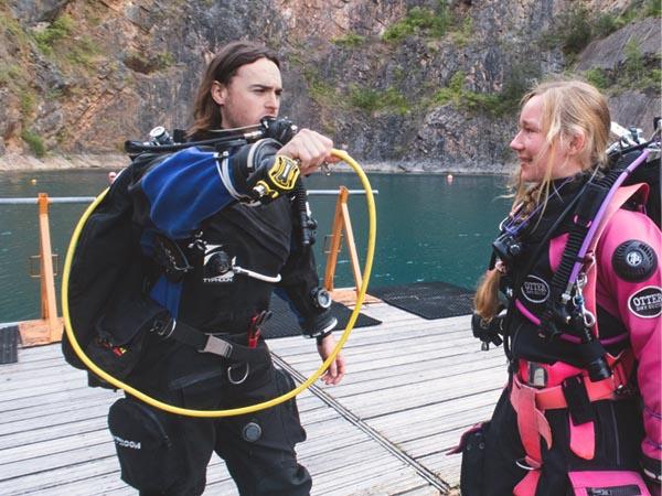 Jacob and student Aithne in full diving kit at NDAC