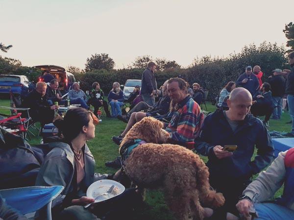 Barbecue and raffle at Cardinney camping park at sunset