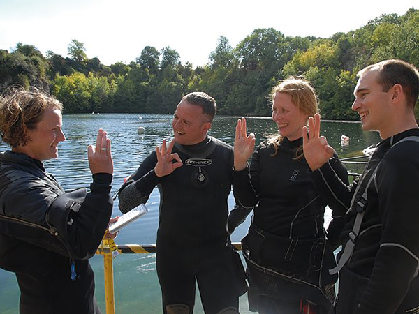 Instructors topside planning a dive