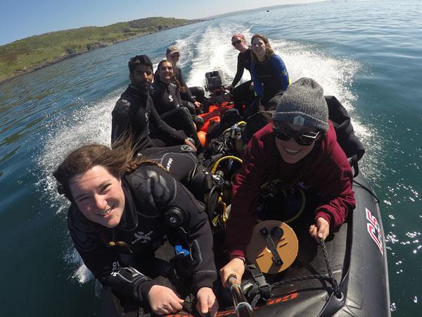 A group of BSAC divers out on a boat ready to dive