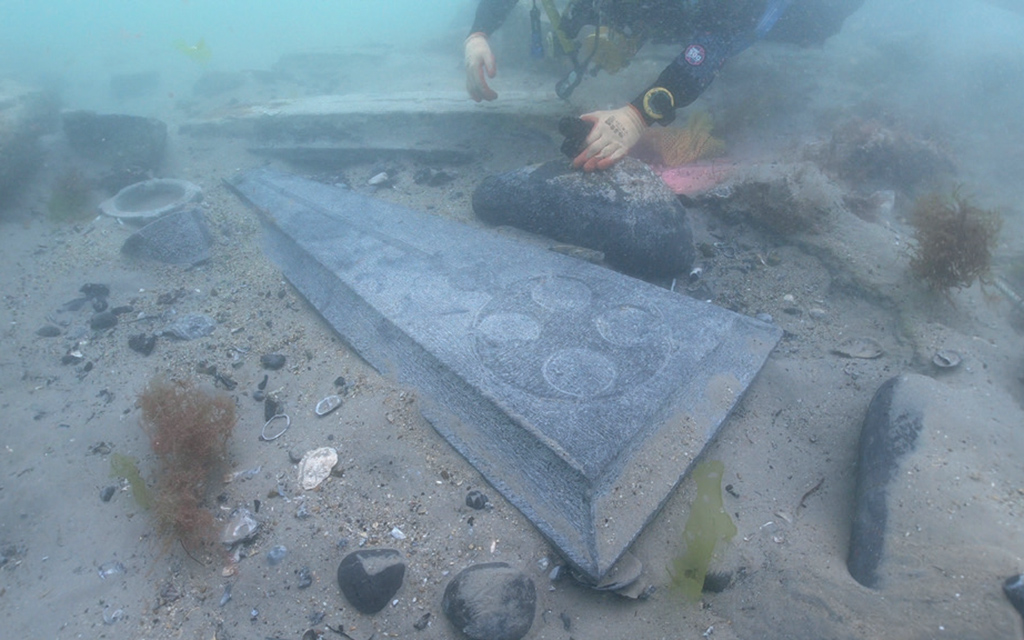 Purbeck stone gravestones on the Mortar Wreck - (c) Bournemouth University