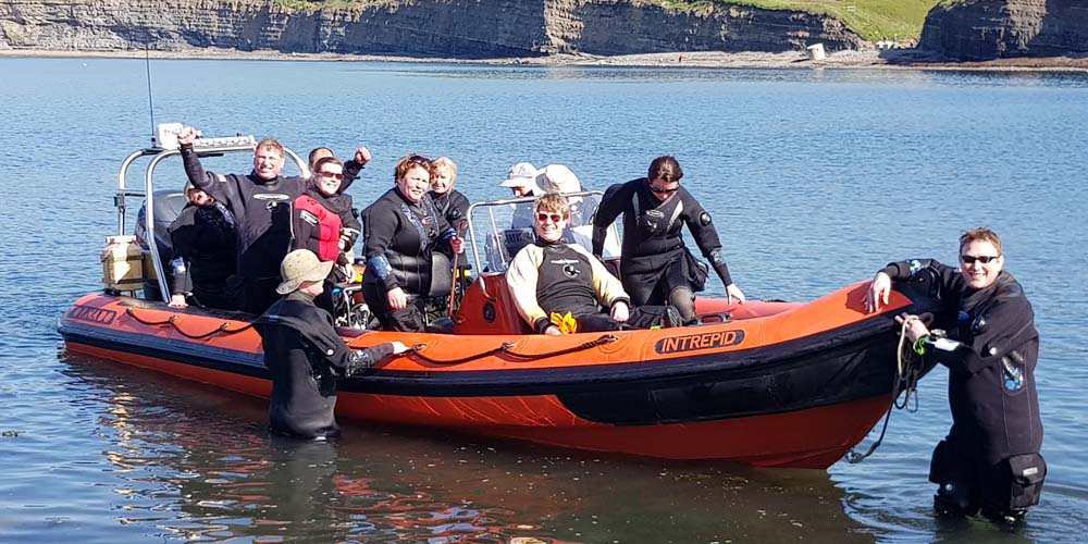 A sunny day and a RIB full of happy divers – what more do you want?