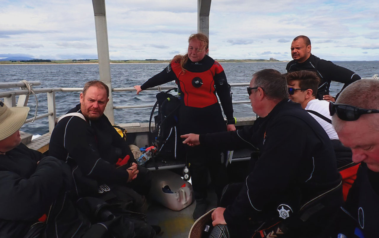 Farne Islands Expedition divers on a boat on the way to the dive site