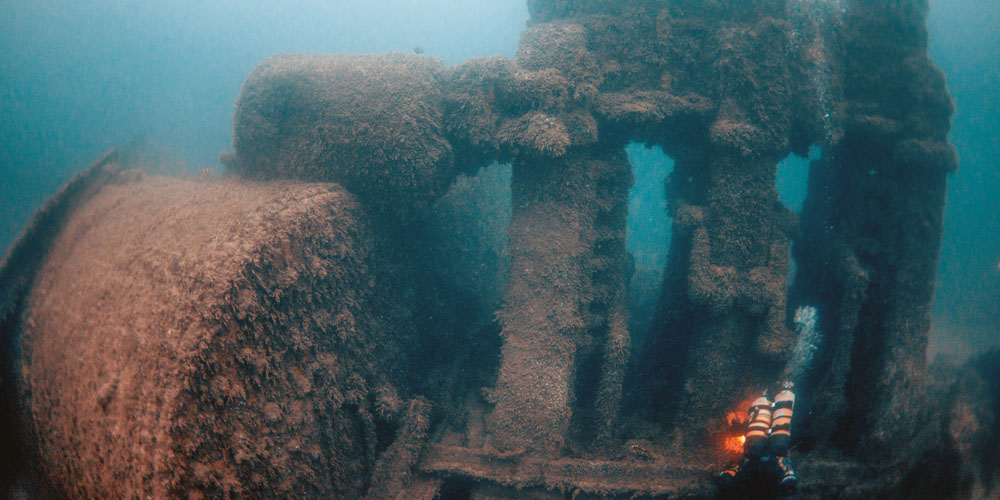 The strangely positioned bow of the Saxmudham; The massive engine and boilers of the Saxmudham 