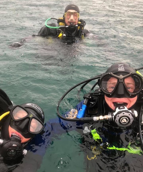 Divers from Bingham club at the surface