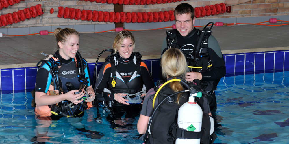 Pool training with one instructor and three students