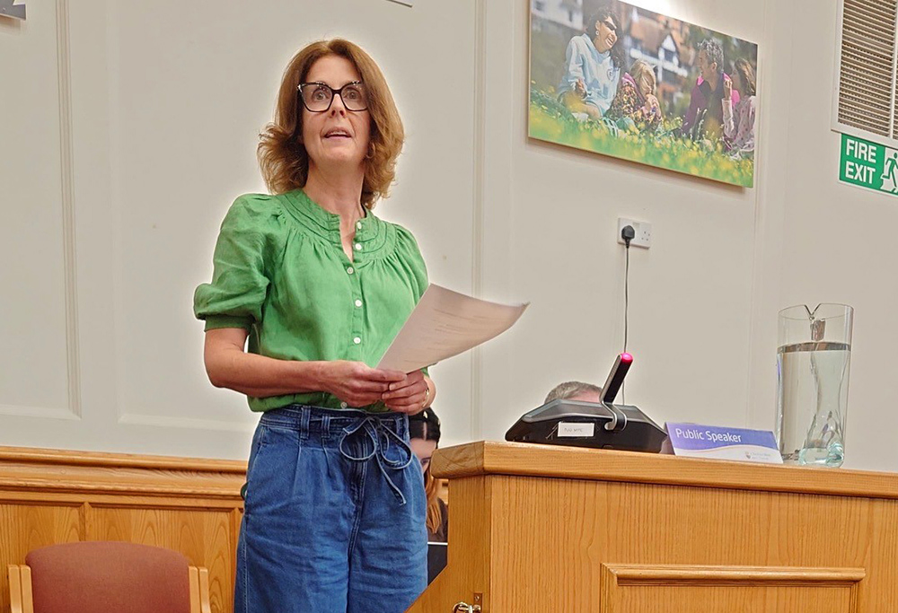 Debbie Powell addresses the meeting