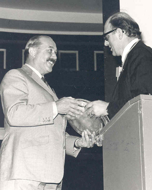 Colin McLeod (l) receiving Silver Salver from Chairman Derek Cockbill (r) Oceans World 2000 Congress - 1973