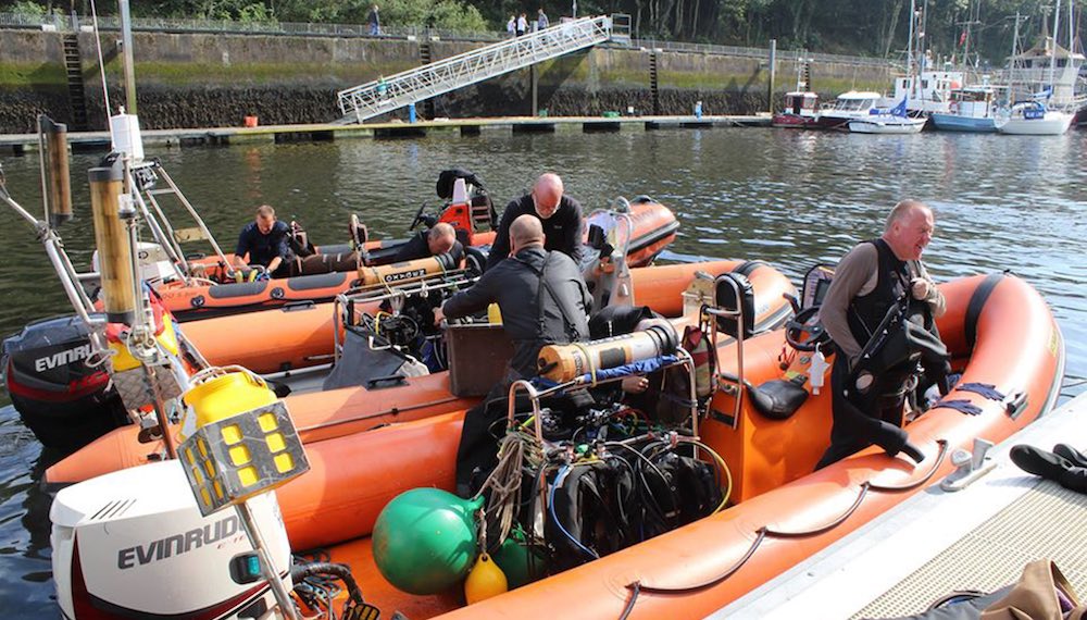 Bingham members aboard prepping two RIBs for a trip at Eyemouth