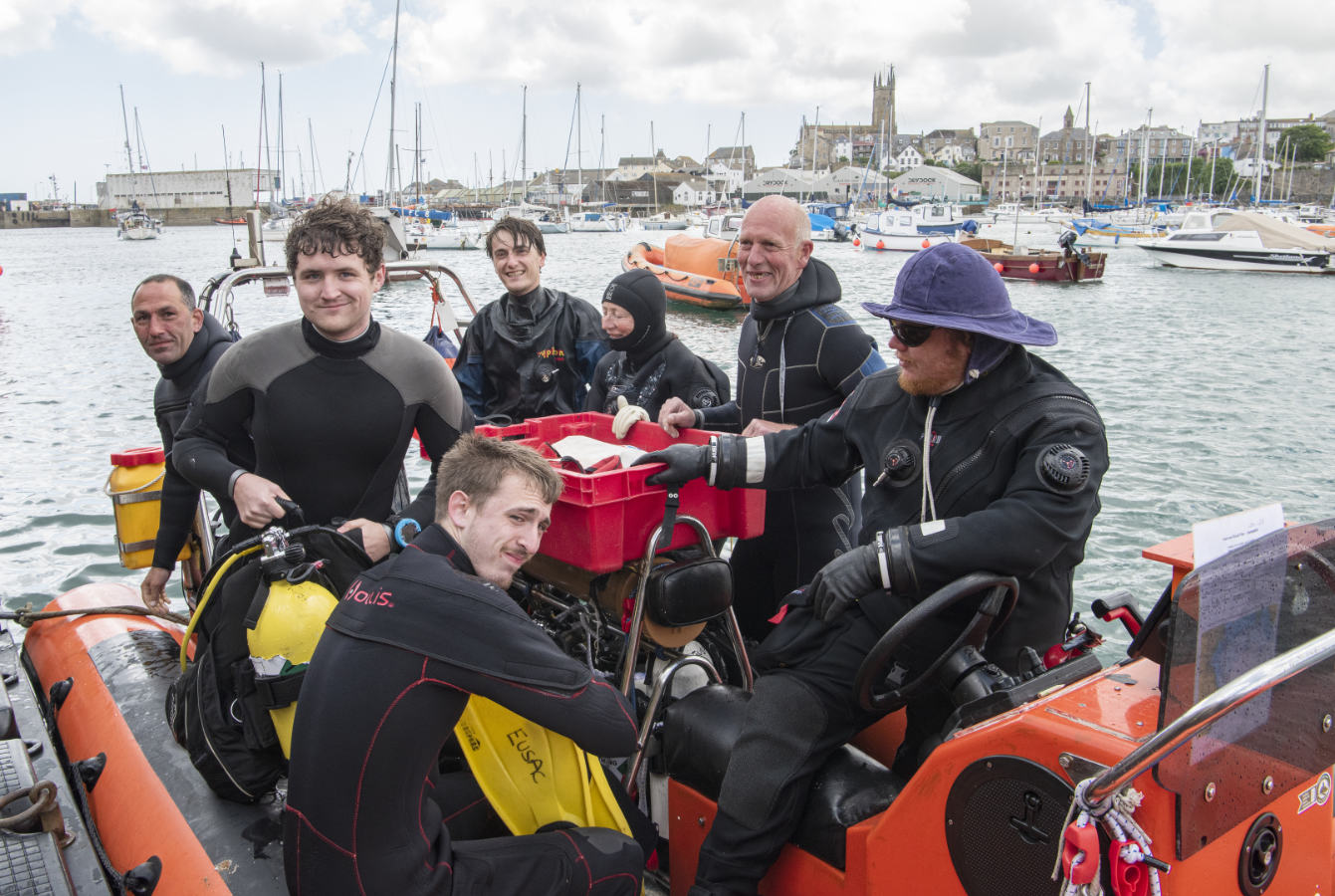 Divers getting ready to set out on a boat