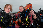 Nick Watson - smiling divers on boat - UK diving - thumbnail