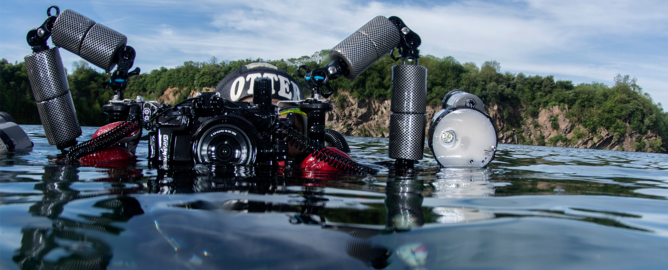 Diver at the surface with a camera