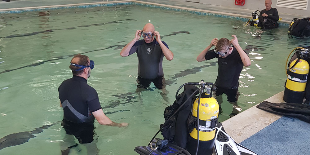 Pool training with precautions at Newbury